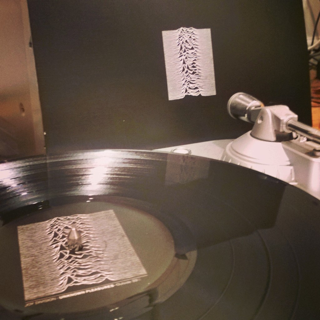 Joy Division's Unknown Pleasures on a record player